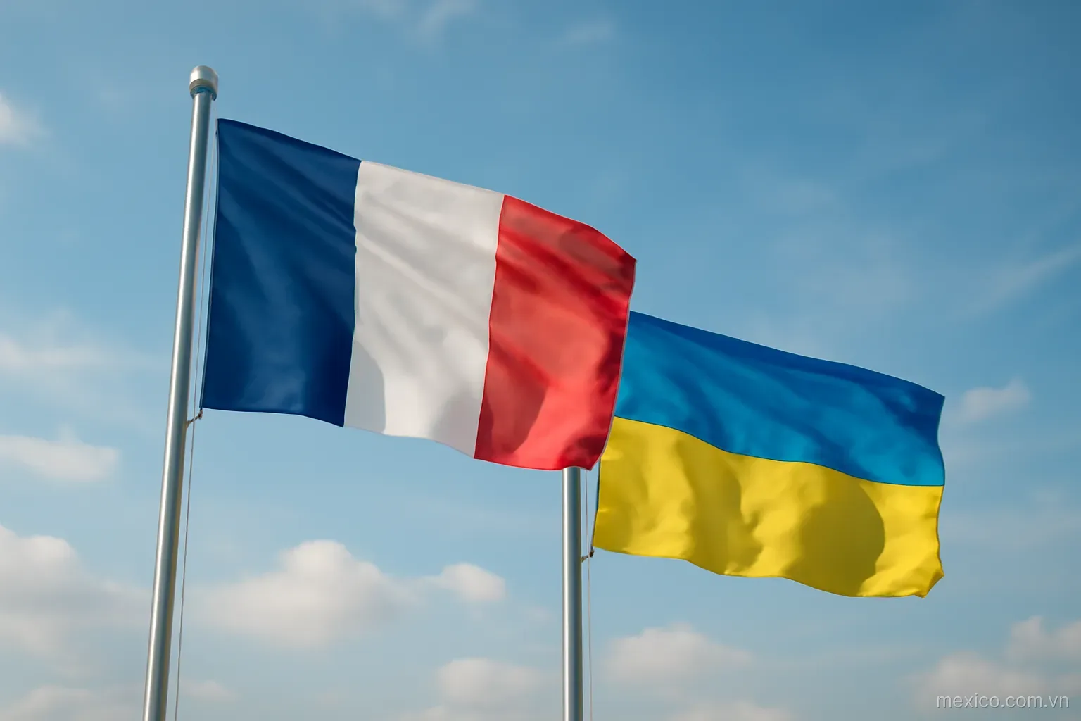 Two flags on poles against an open sky, low angle, no text